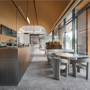 Office Interior Design featuring a modern workspace with ergonomic furniture, natural lighting, and a thoughtfully planned layout to enhance productivity and focus.